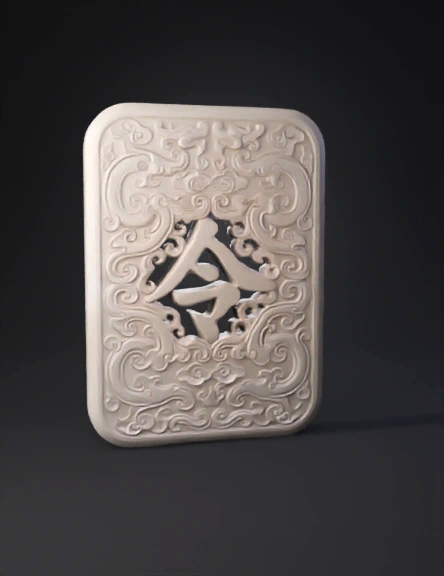 ornate ivory carved panel with cloud scrolls and central lattice desig